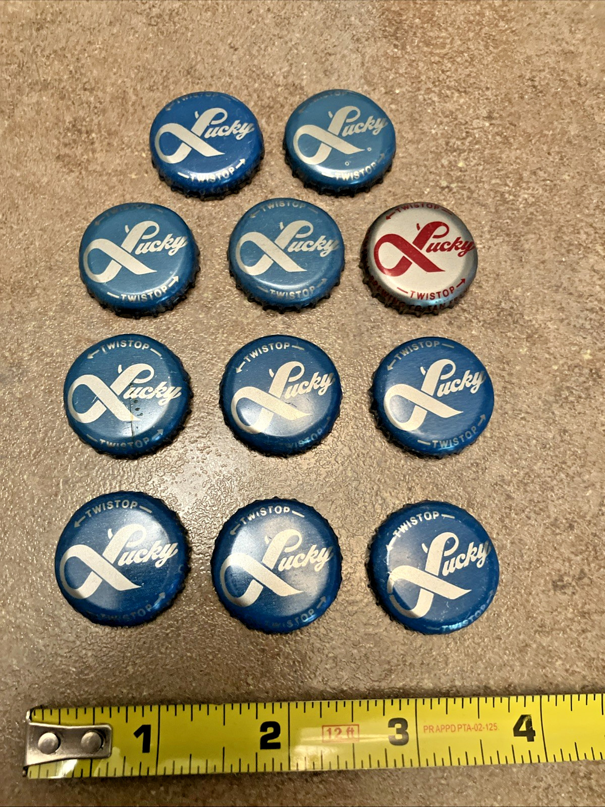 11 Vintage Lucky Lager Beer Bottle Caps Featuring Red Rebus Puzzles, 