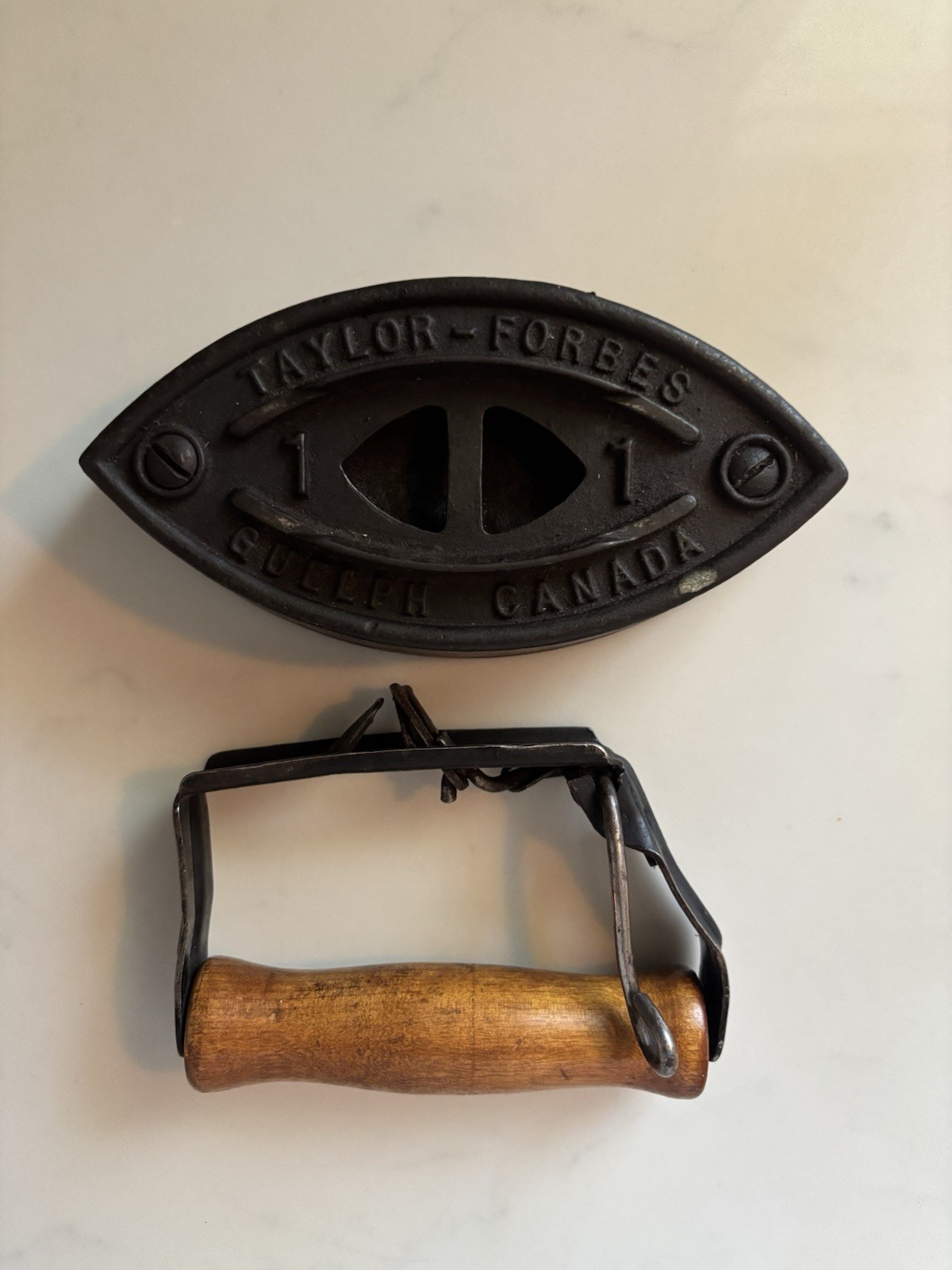 Vintage Taylor-Forbes No. 1 sad iron made in Guelph, Ontario, Canada.