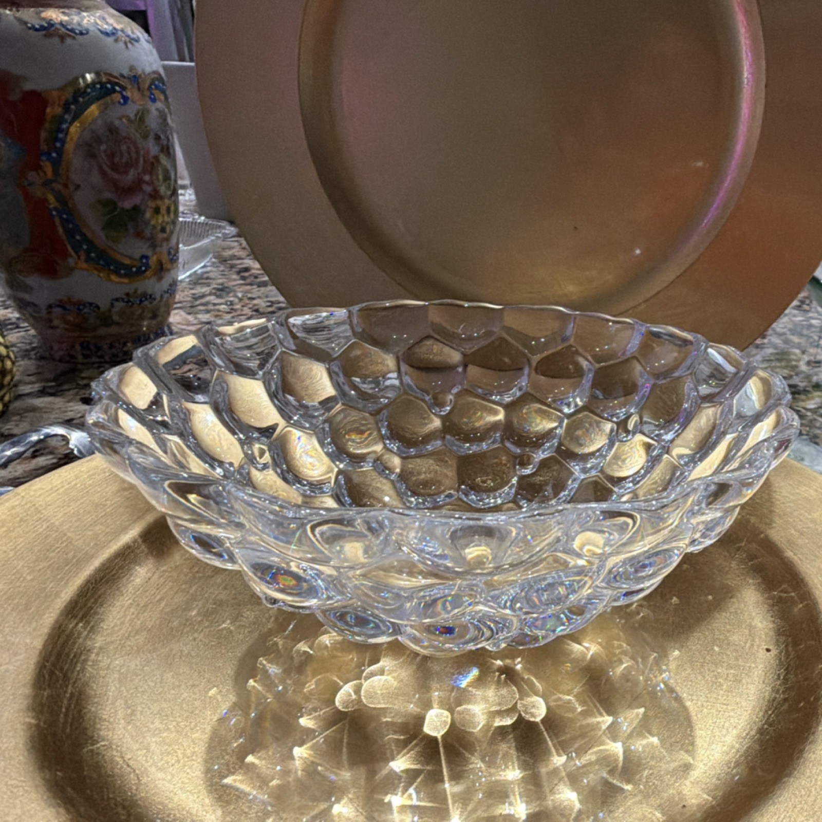 This crystal bowl is the Orrefors Raspberry pattern, designed by Anne Nilsson.