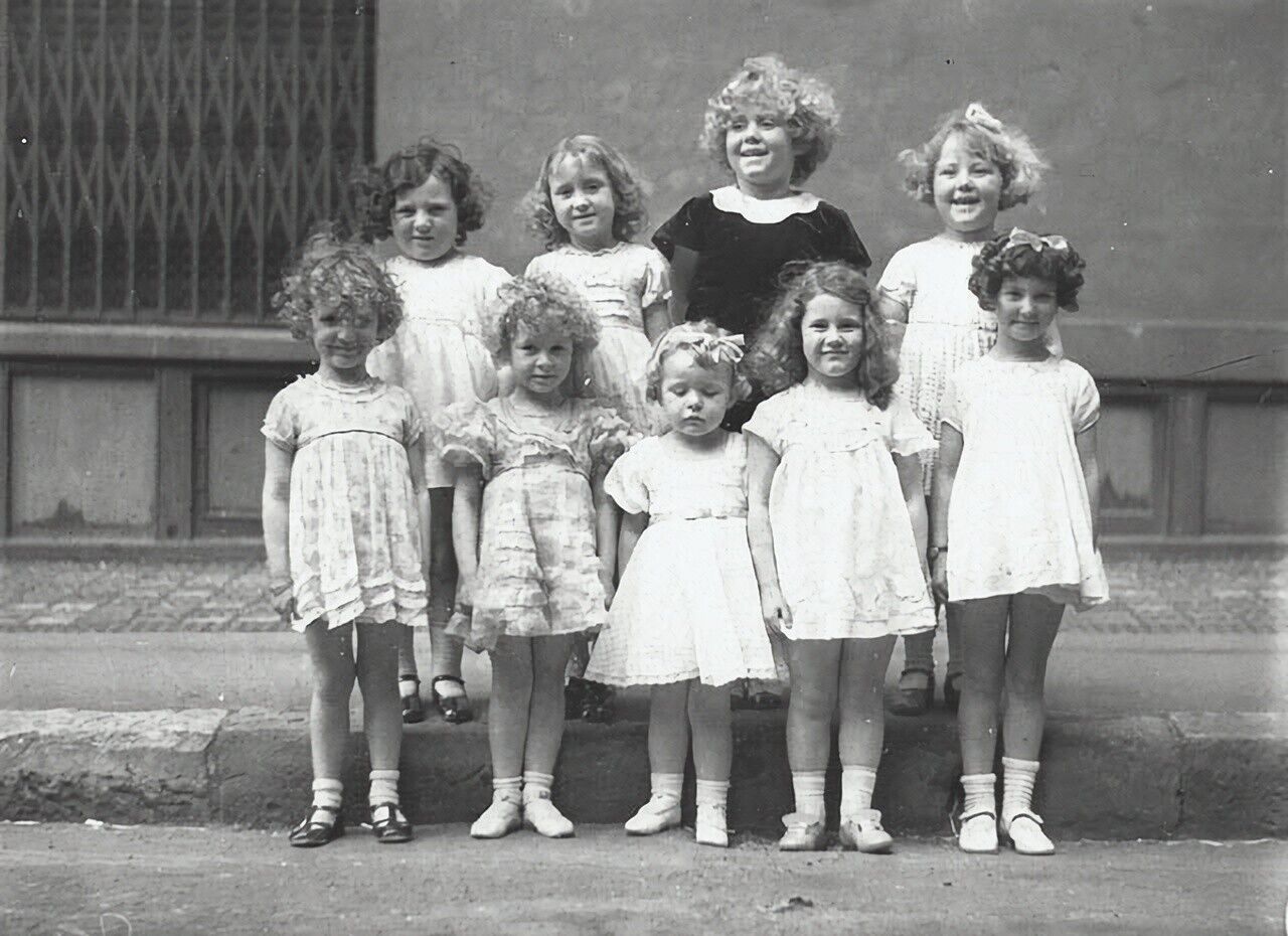 Black and White Photo Nine  Girls Looking Like Shirley Temple Reprint A-12