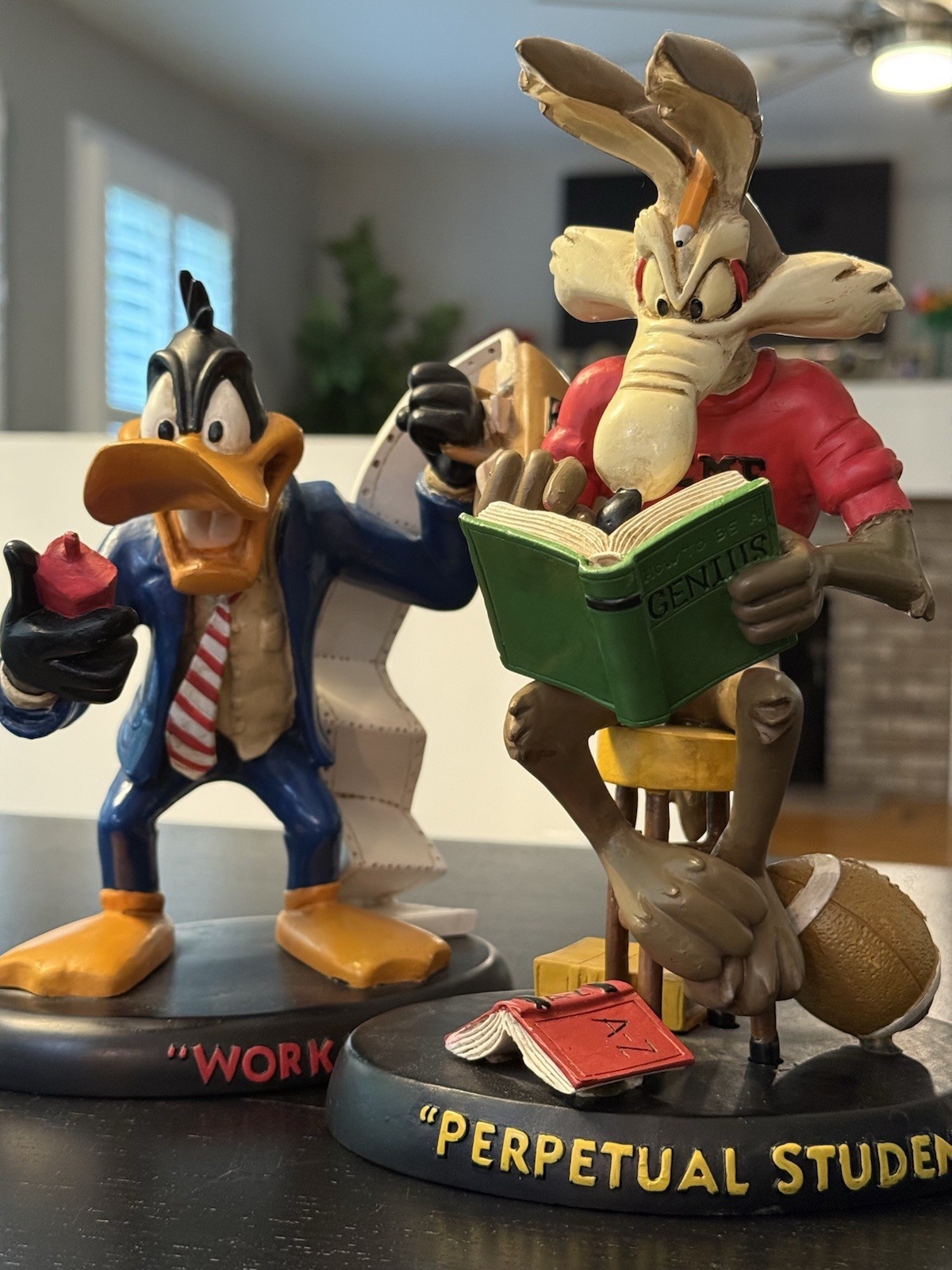 Warner Bros. Daffy Duck and Wile E Coyote Statues