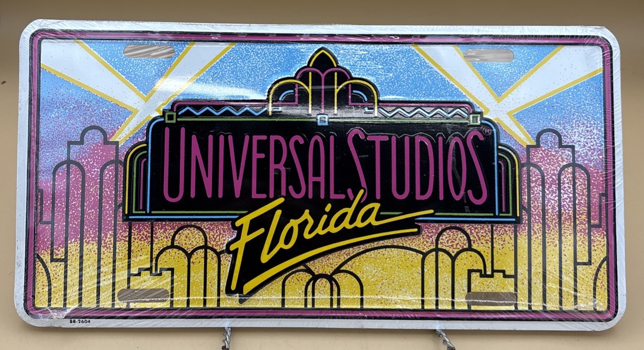 Vintage Universal Studios Florida  Metal License Plate Still Sealed Brand NEW