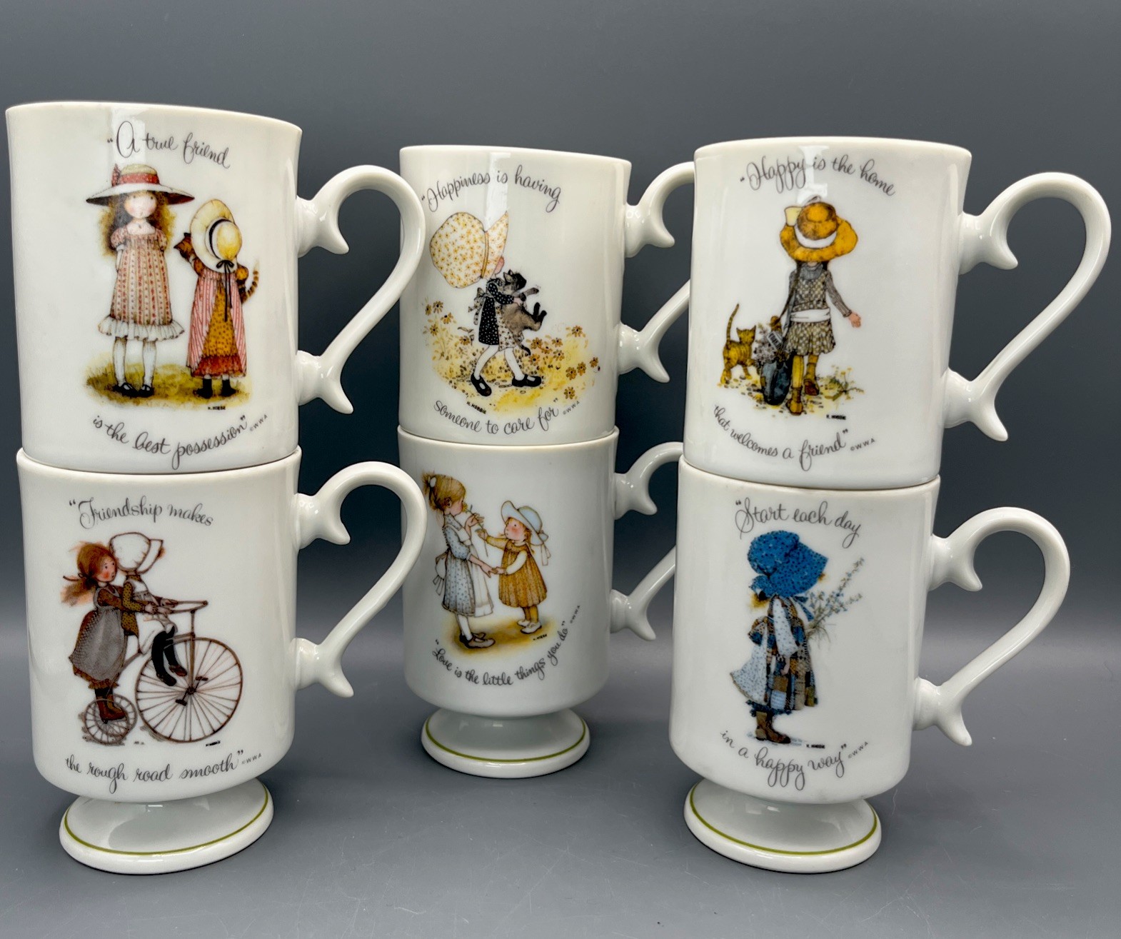 Vintage 1973 Holly Hobbie Pedestal Mugs Set of 6 Porcelain Japan World Wide Arts Vintage 1973 Holly Hobbie Pedestal Mugs Set of 6 Porcelain Japan World Wide Arts