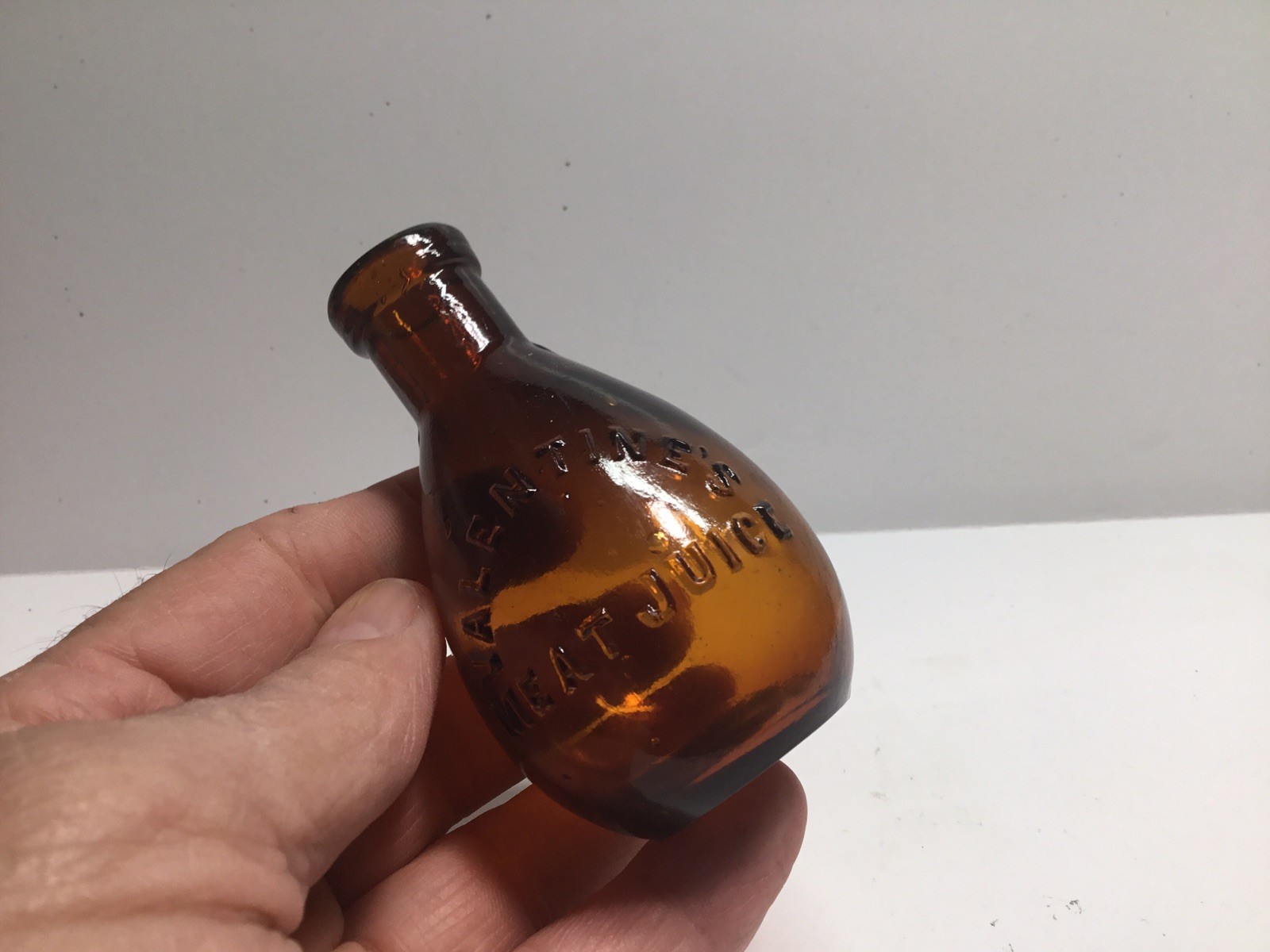 Antique Amber Valentines Meat Juice Bottle.