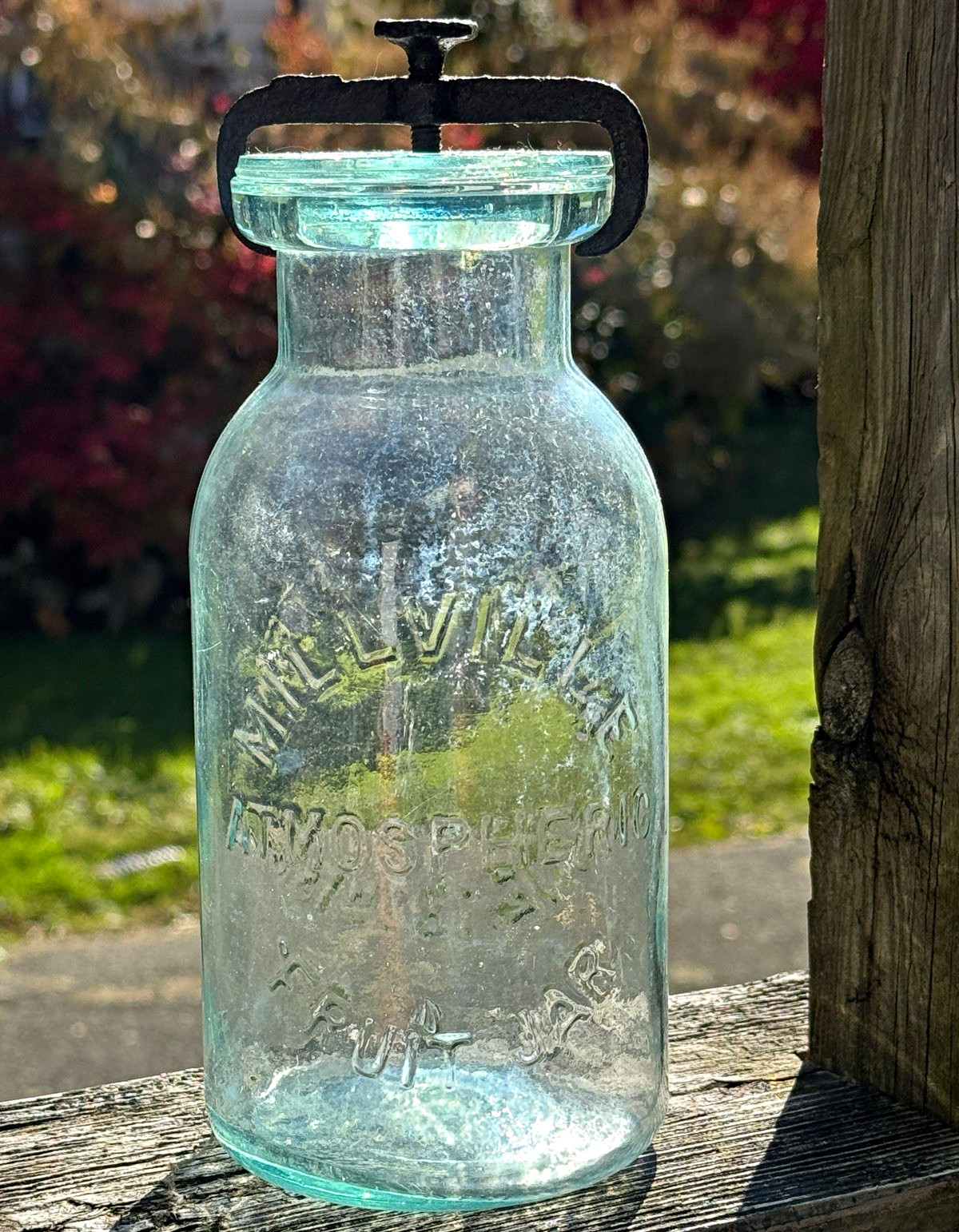 Antique civil war era quart Millville atmospheric fruit jar complete with clamp