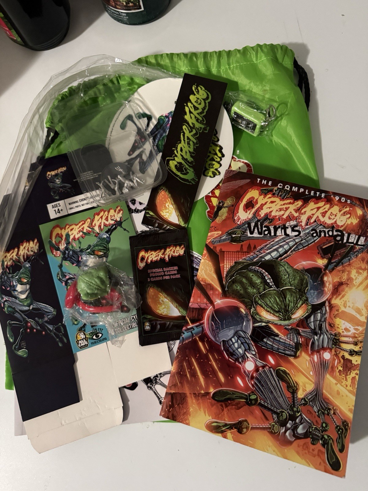 Cyberfrog Warts and All Softcover In Fun Bag With Extras ComicsGate EVS Cyberfrog Warts and All Softcover In Fun Bag With Extras ComicsGate EVS