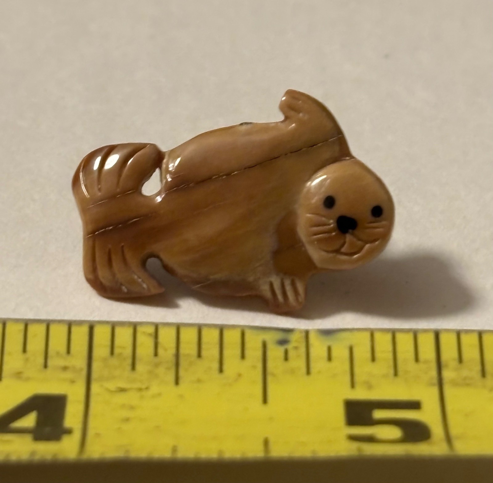 CASSIAR MOUNTAIN BRITISH COLUMBIA CANADA HAND CARVED SEAL PIN BACK