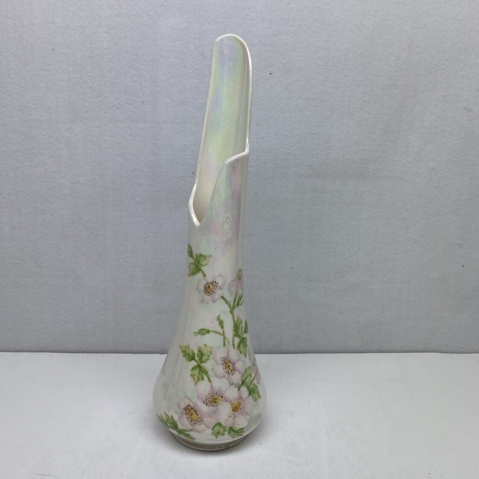 Vintage Ceramic iridescent floral vase. 17 “ tall. About 5 inches wide at Base.