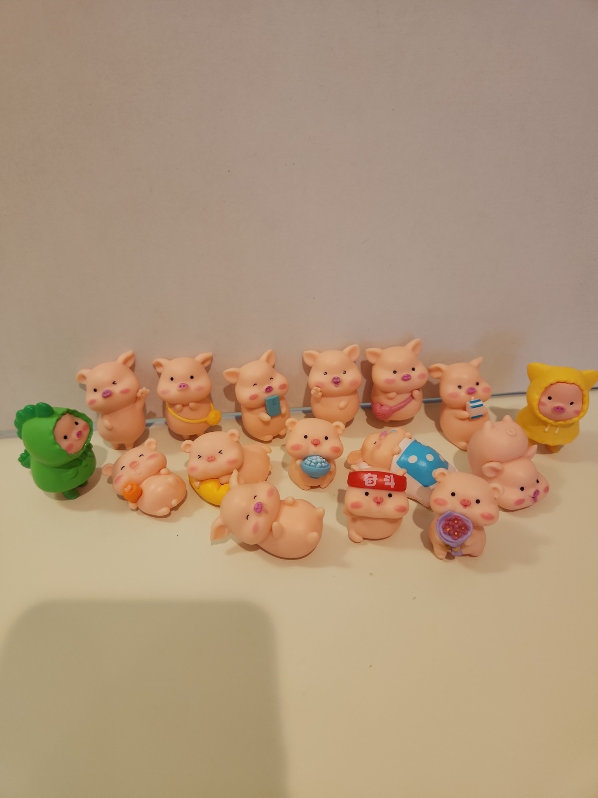 Piggie Collection. 16 Plastic 3-4 cm Pig Figurines. An Entire Collection of... Piggie Collection. 16 Plastic 3-4 cm Pig Figurines. An Entire Collection of...
