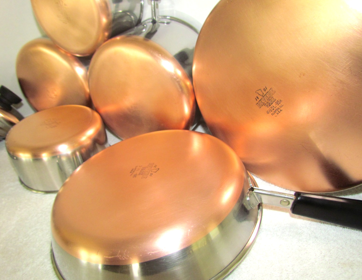 VINTAGE REVERE WARE POTS, PANS, SKILLET, ALL WITH LIDS COPPER CLAD MADE IN USA VINTAGE REVERE WARE POTS, PANS, SKILLET, ALL WITH LIDS COPPER CLAD MADE IN USA