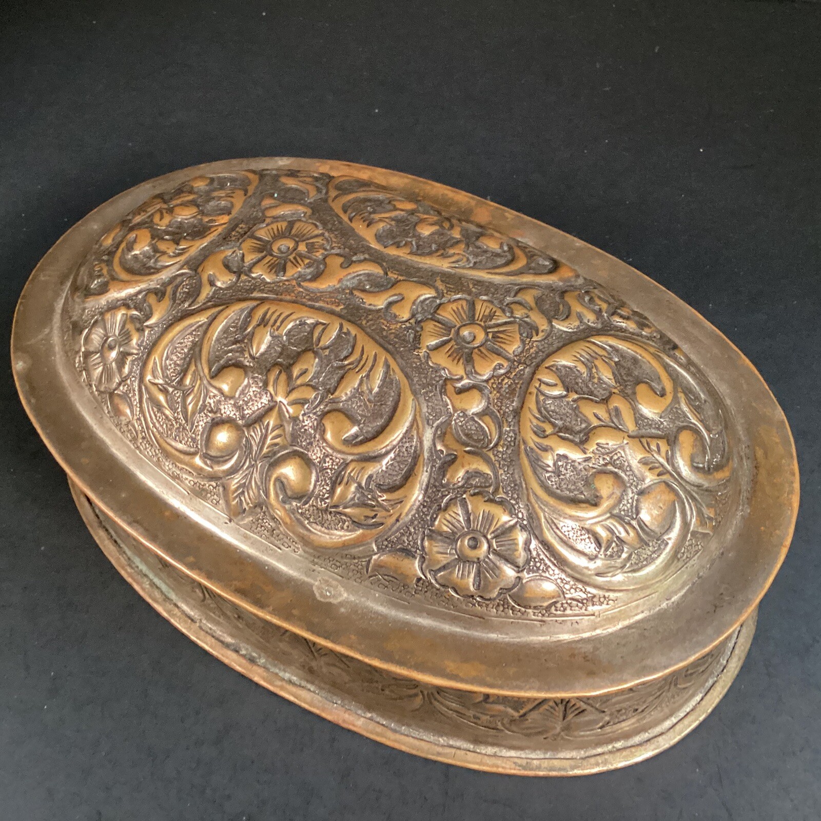 Vintage oval Ornate Scroll pressed embossed tin box Vintage oval Ornate Scroll pressed embossed tin box