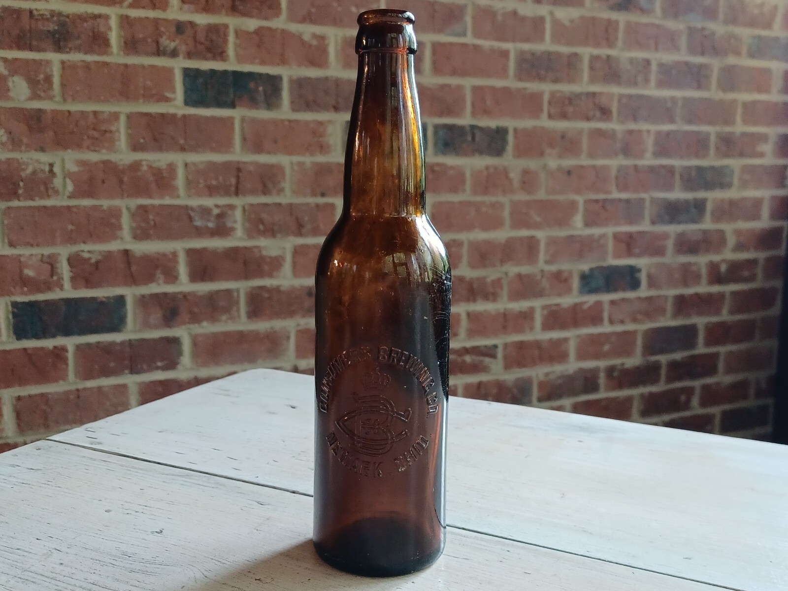 Antique CONSUMERS BREWING CO. Newark OHIO OH Early BEER BOTTLE Amber Embossed