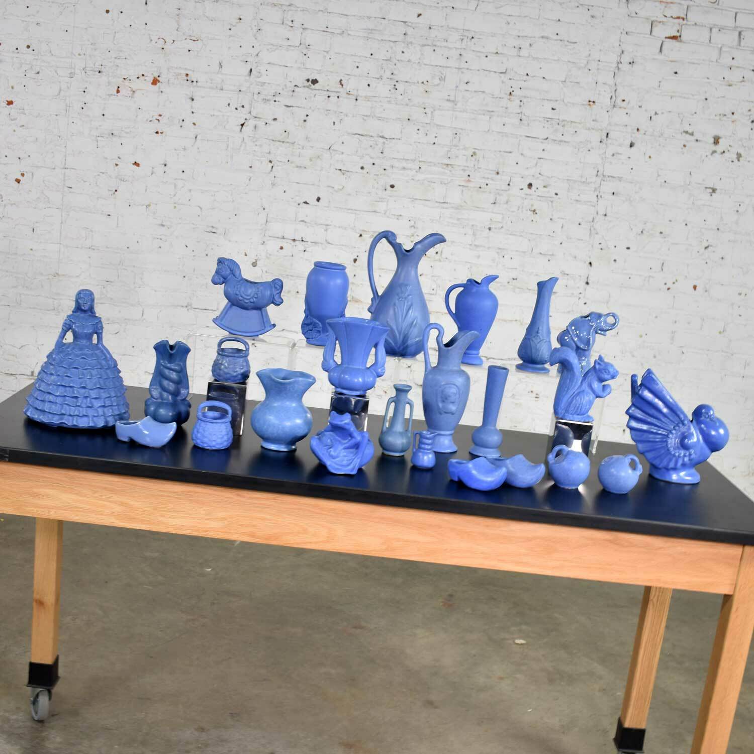 Mid Century Niloak Pottery Blue Vases and Objet d'Art 24 Piece Collection