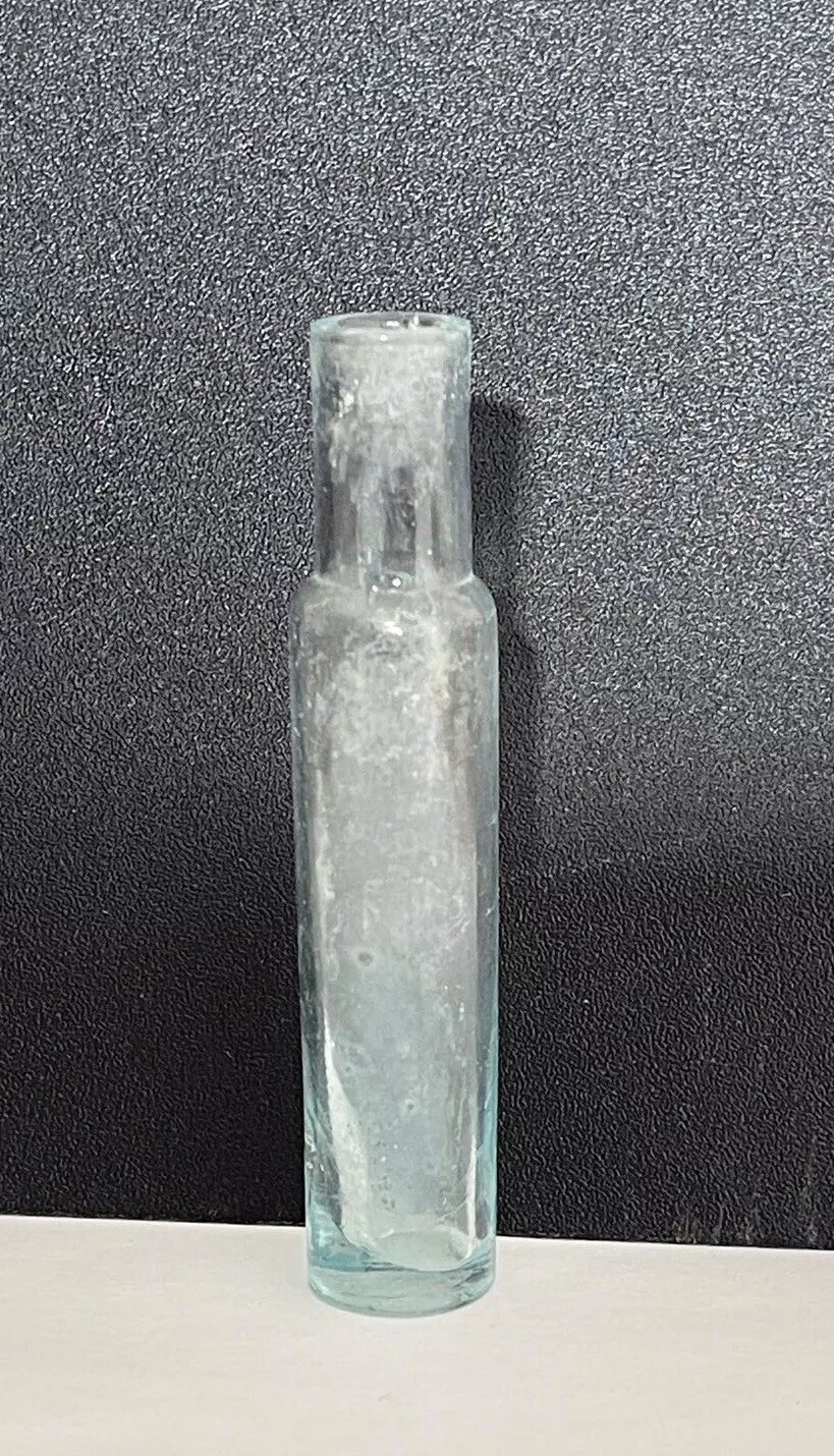 Antique pharmacy bottle from the 1800s.OPEN PONTIL
