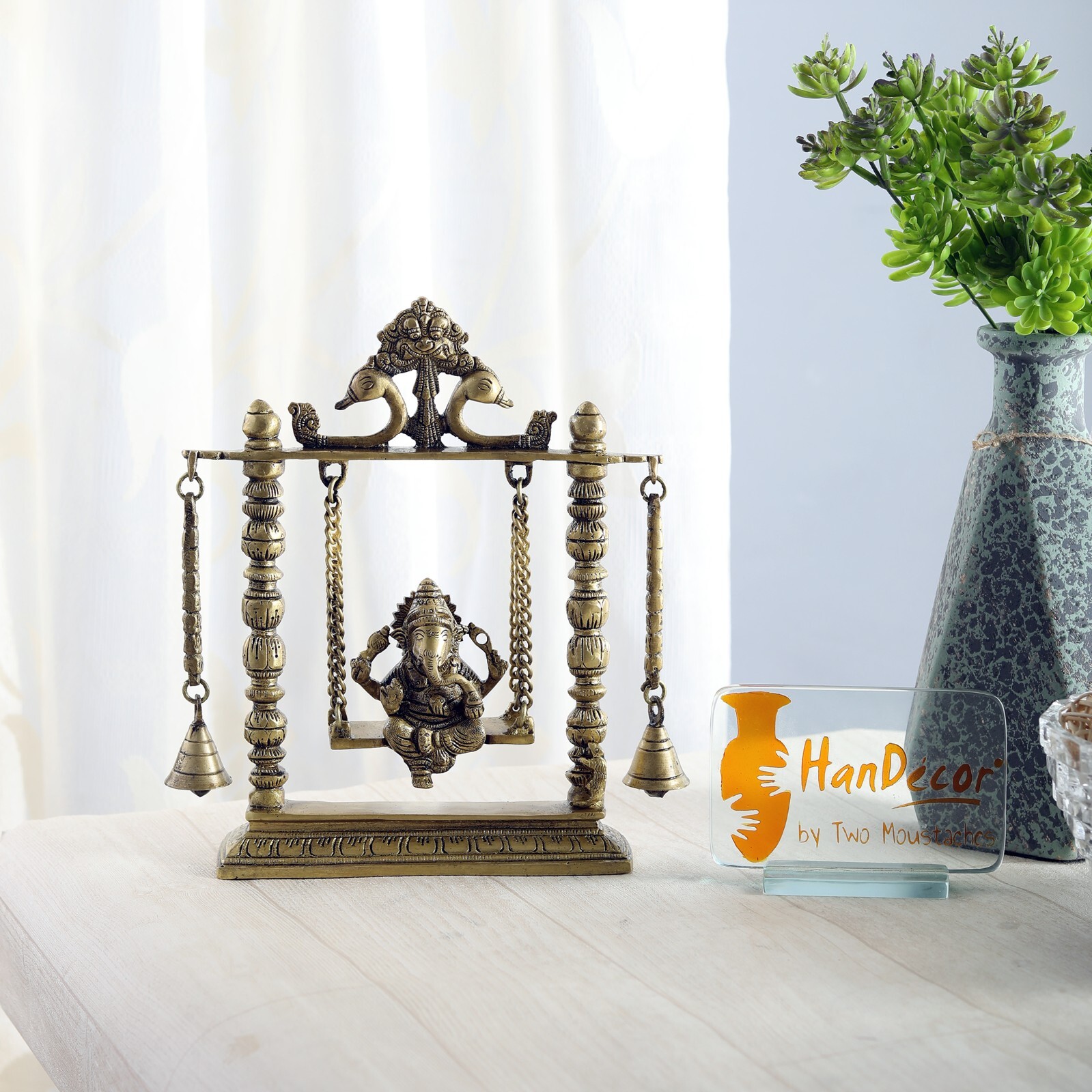 Brass Ganesha On Jhoola Swing with Bells Showpiece Brass Ganesha On Jhoola Swing with Bells Showpiece