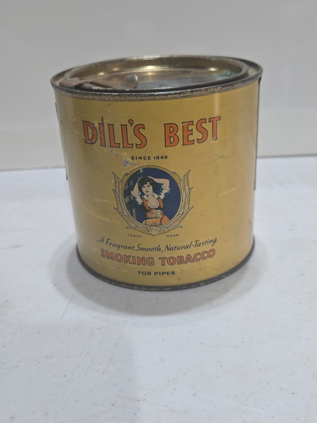 Vintage Dill\'s Best Since 1848 Smoking Tobacco Tin Can with tax stamp.