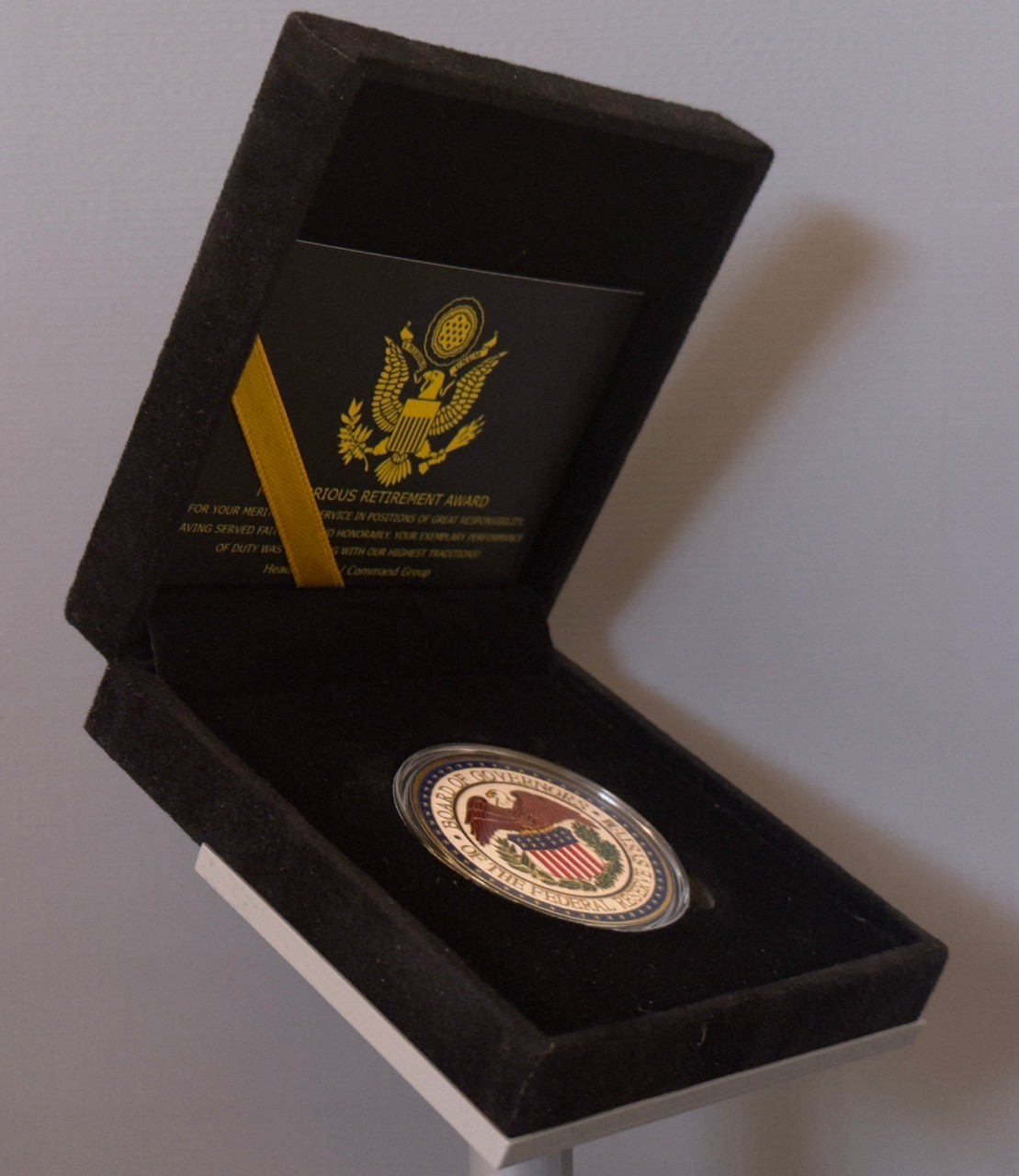 U.S. Federal Reserve Board of Governors Challenge Coin in Display Case