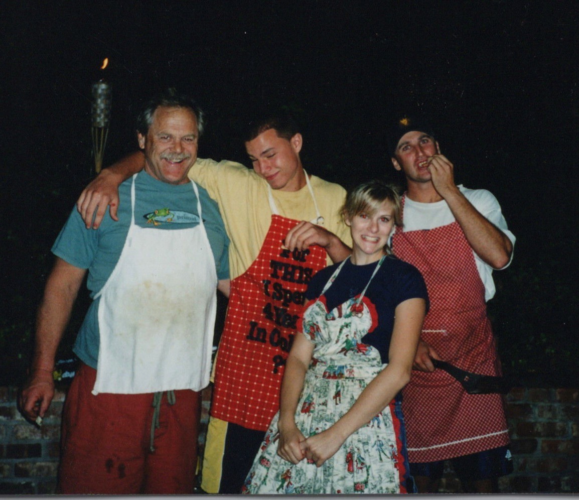 1990s Elderly Man Two Men Woman Friends Smiling Aprons Barbecue Cookout Group