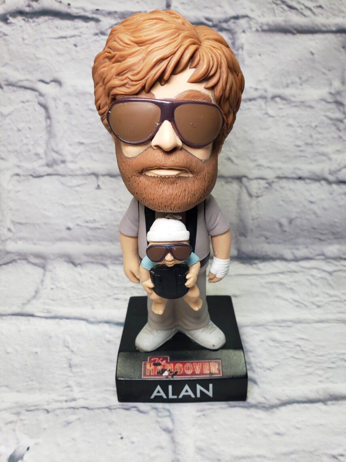 Alan The Hangover Funko Bobblehead with baby Carlos