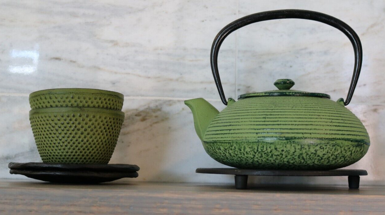 Vintage Teavana Cast Iron Teapot Set w/ 2 Cups, 2 Saucers, & Trivet Green