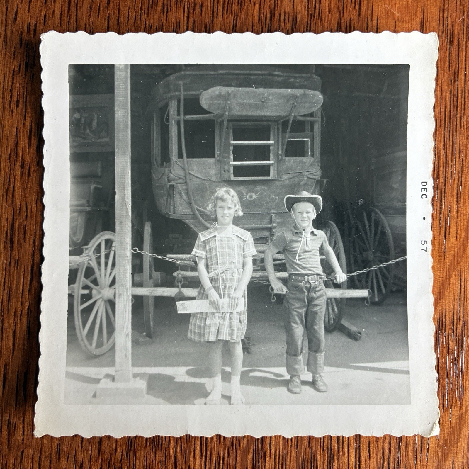 1950s theme park Knott\'s Berry Farm? cowboy hat stagecoach display boy girl 1957
