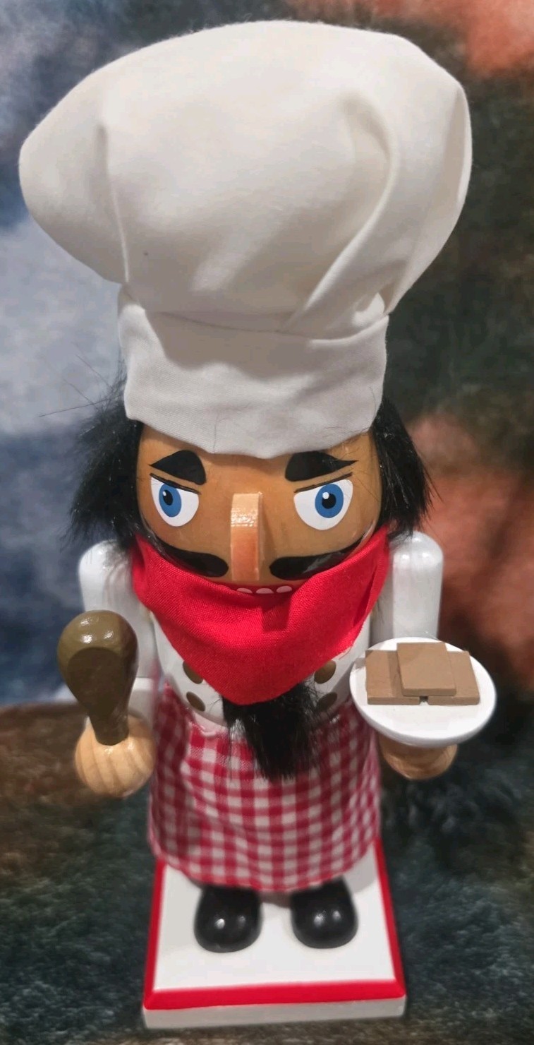 Kurt S. Adler Chef Nutcracker 2019 Wooden 2019 Holding Choc Treats & Spatula Kurt S. Adler Chef Nutcracker 2019 Wooden 2019 Holding Choc Treats & Spatula