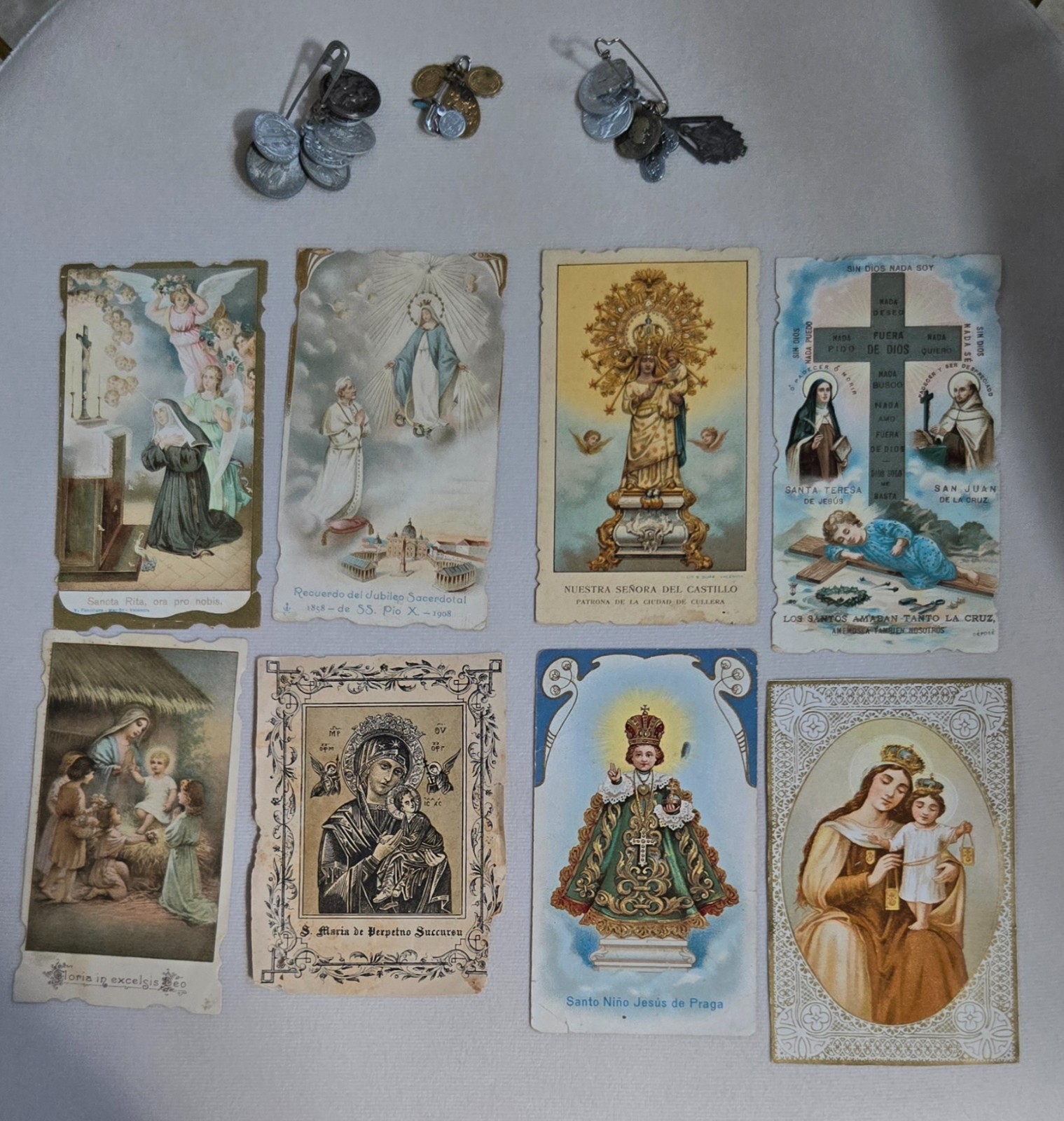 8 Antique Catholic Prayer Cards and 19 Medals from San Sebastian, Spain 8 Antique Catholic Prayer Cards and 19 Medals from San Sebastian, Spain