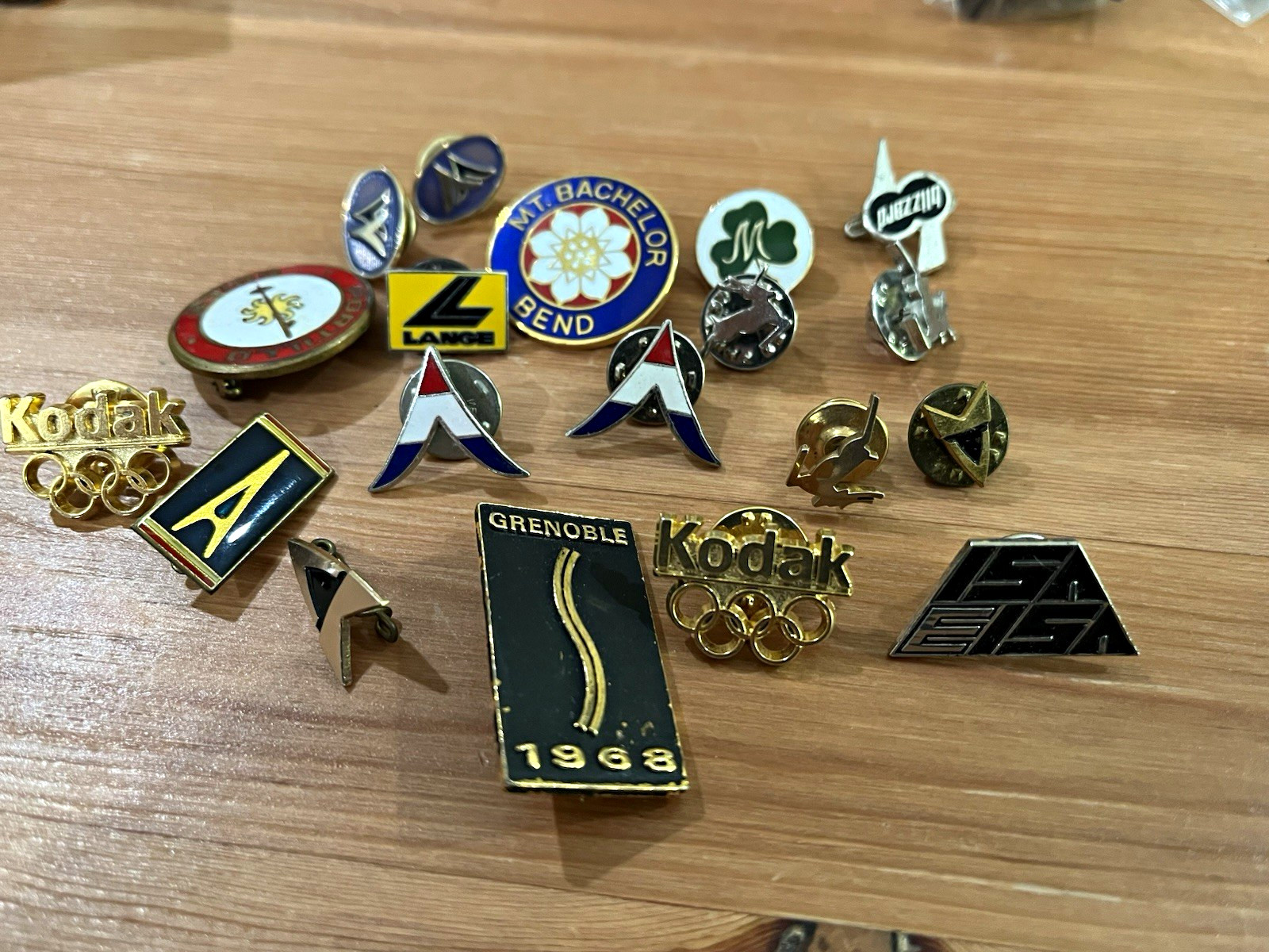 Vintage Olympics Pinback and ski pins.