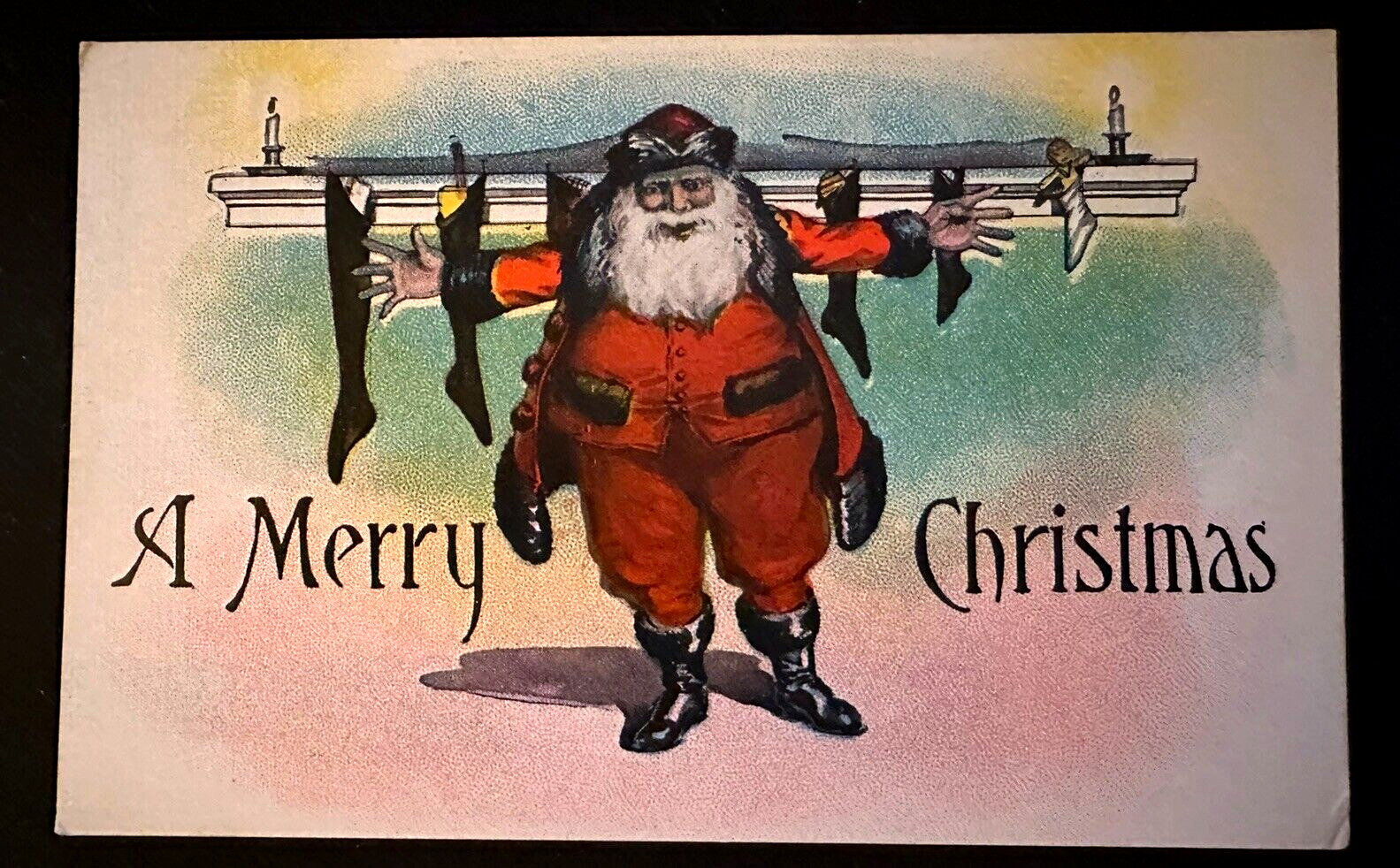 Red Robe Santa Claus at Mantle with Stockings~Antique Christmas~Postcard~k750
