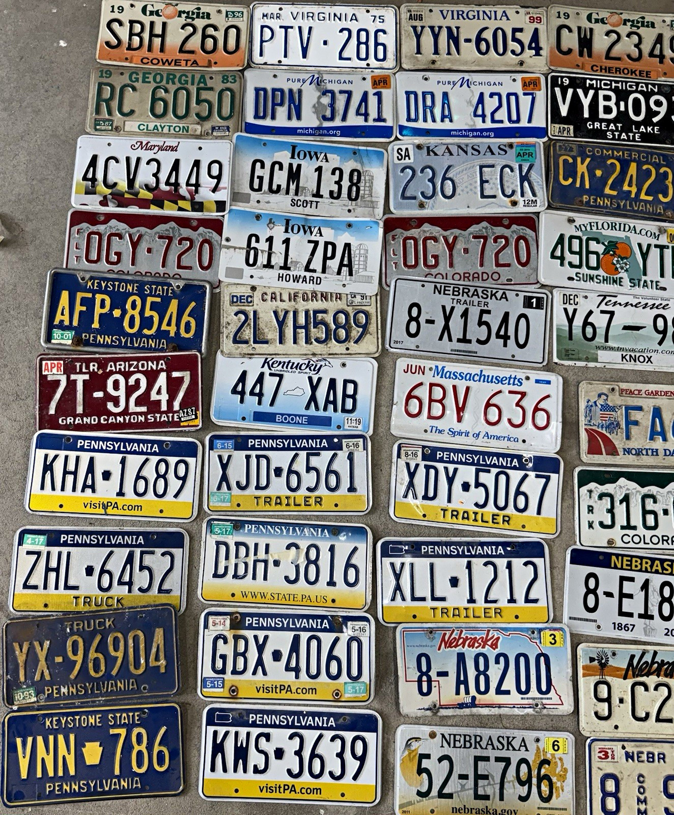 50 Mixed lot of collectible US license plates - PA MT NE VA CA CO various years 50 Mixed lot of collectible US license plates - PA MT NE VA CA CO various years