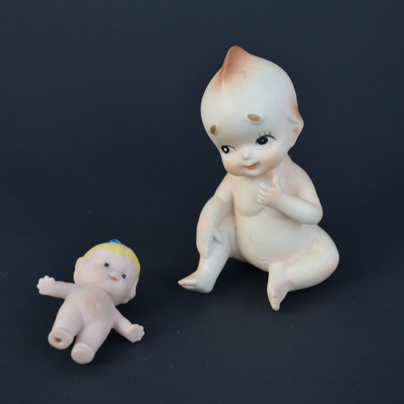 Vintage Bisque Porcelain Kewpie Doll Figurine & Brooch Pin Lot Vintage Bisque Porcelain Kewpie Doll Figurine & Brooch Pin Lot