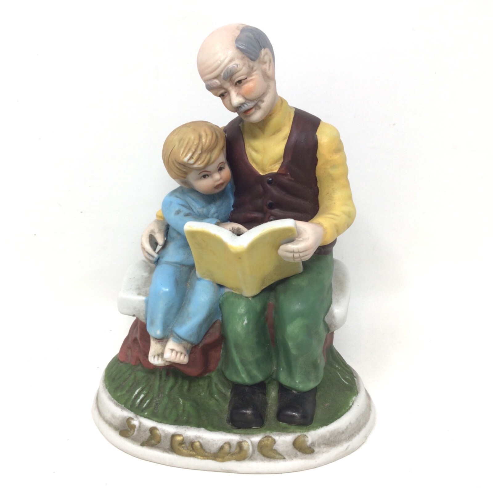 Grandfather Reading Book to Grandson Child Sitting on Bench Ceramic Figurine