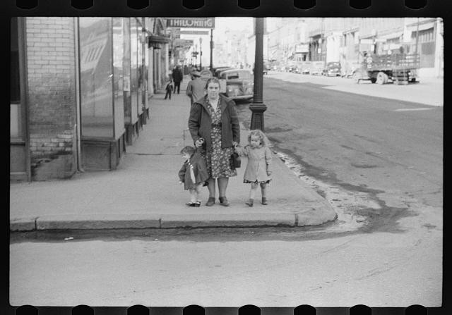 Photo:1930s Street Scene Woman and Children Sidewalk City View