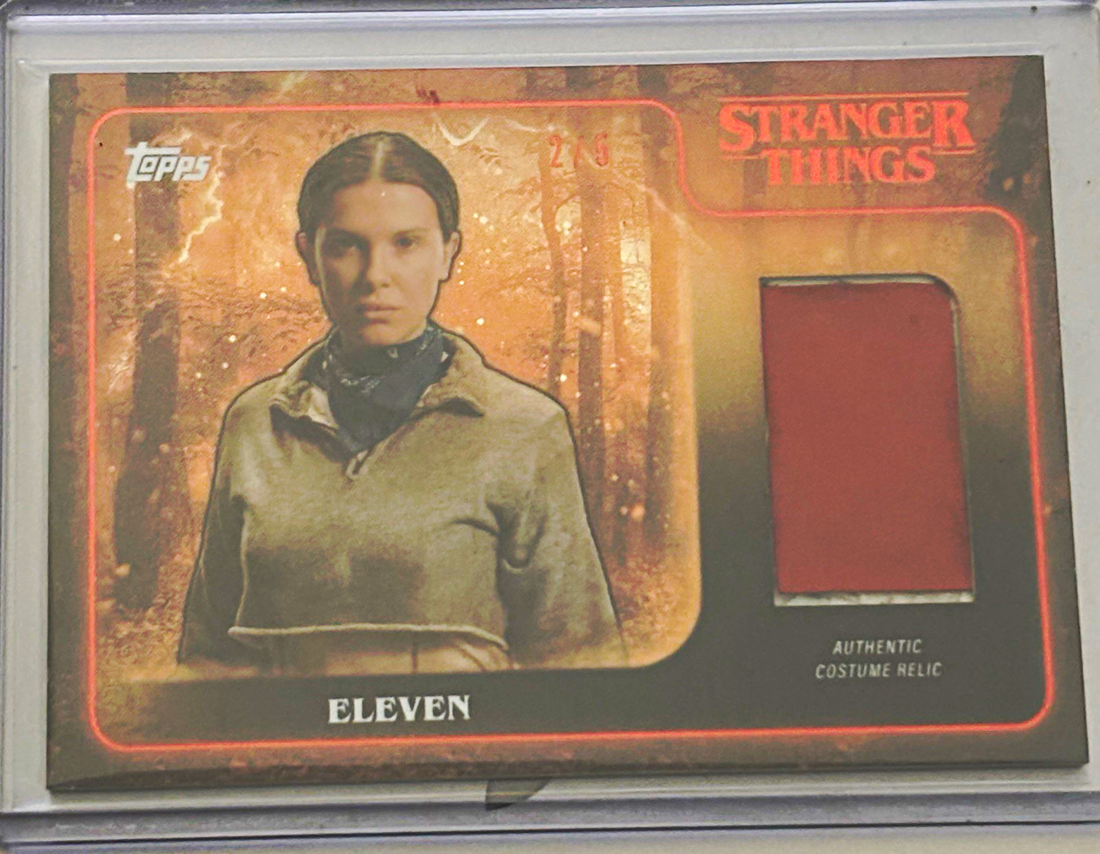 2025 Topps Stranger Things Eleven Orange Costume Relic Trading Card RARE