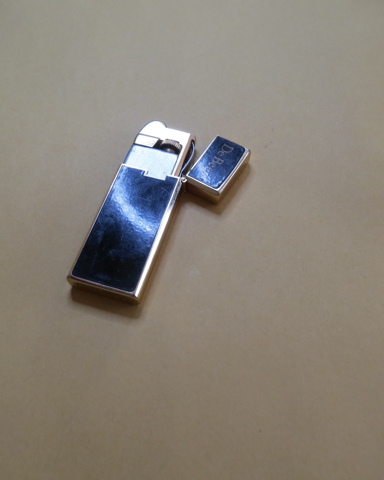 Vintage Penguin De Beers lighter