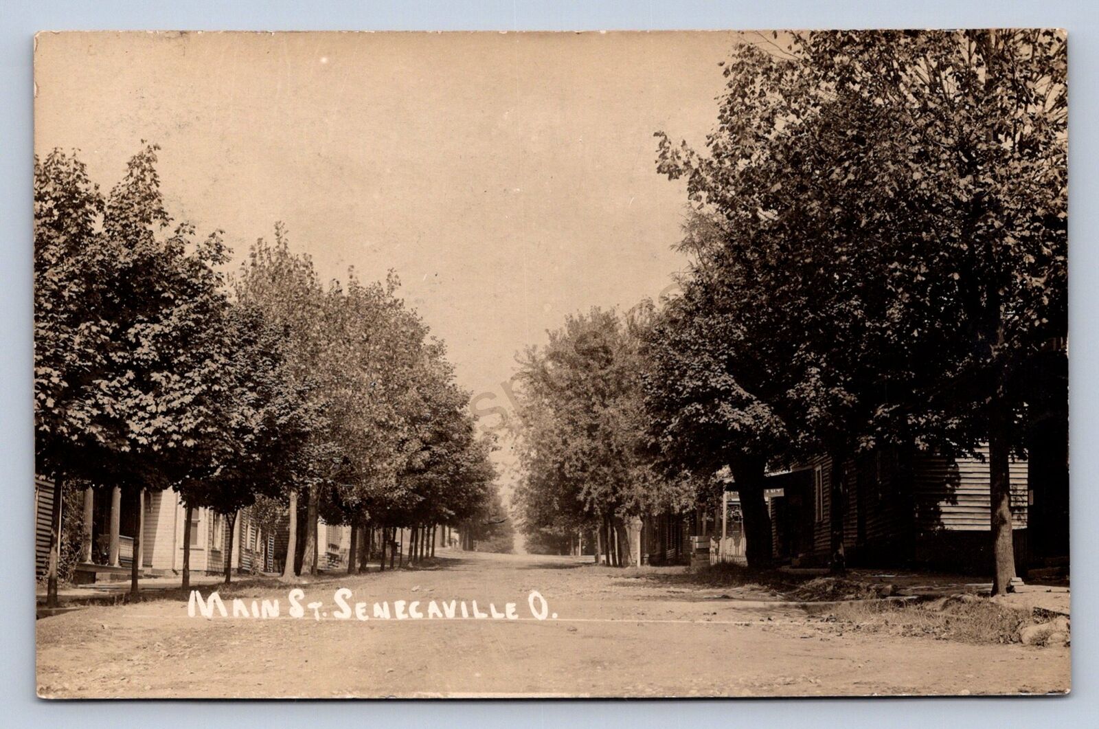 J87/ Senecaville Ohio RPPC Postcard c1910 Cambridge Main St Homes 1727