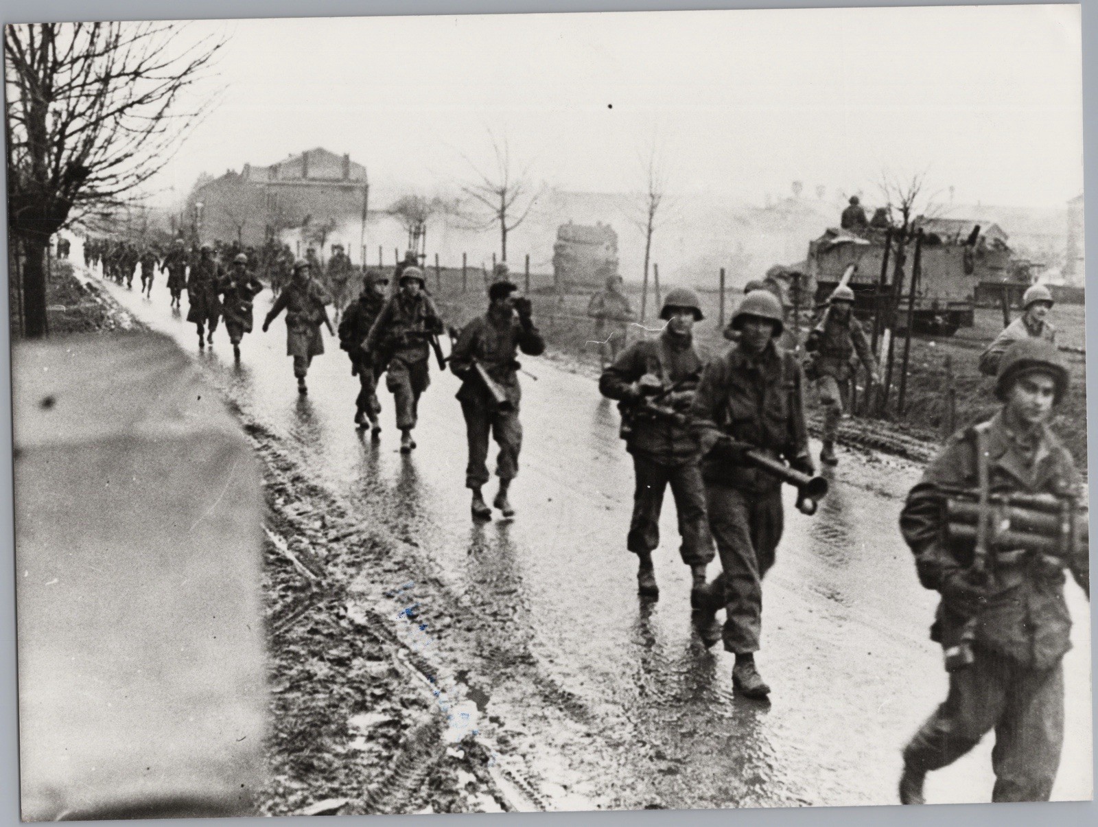 A02 A0205 – WWII Battle of the Ardennes, US Infantry Marching to Bastogne 1944