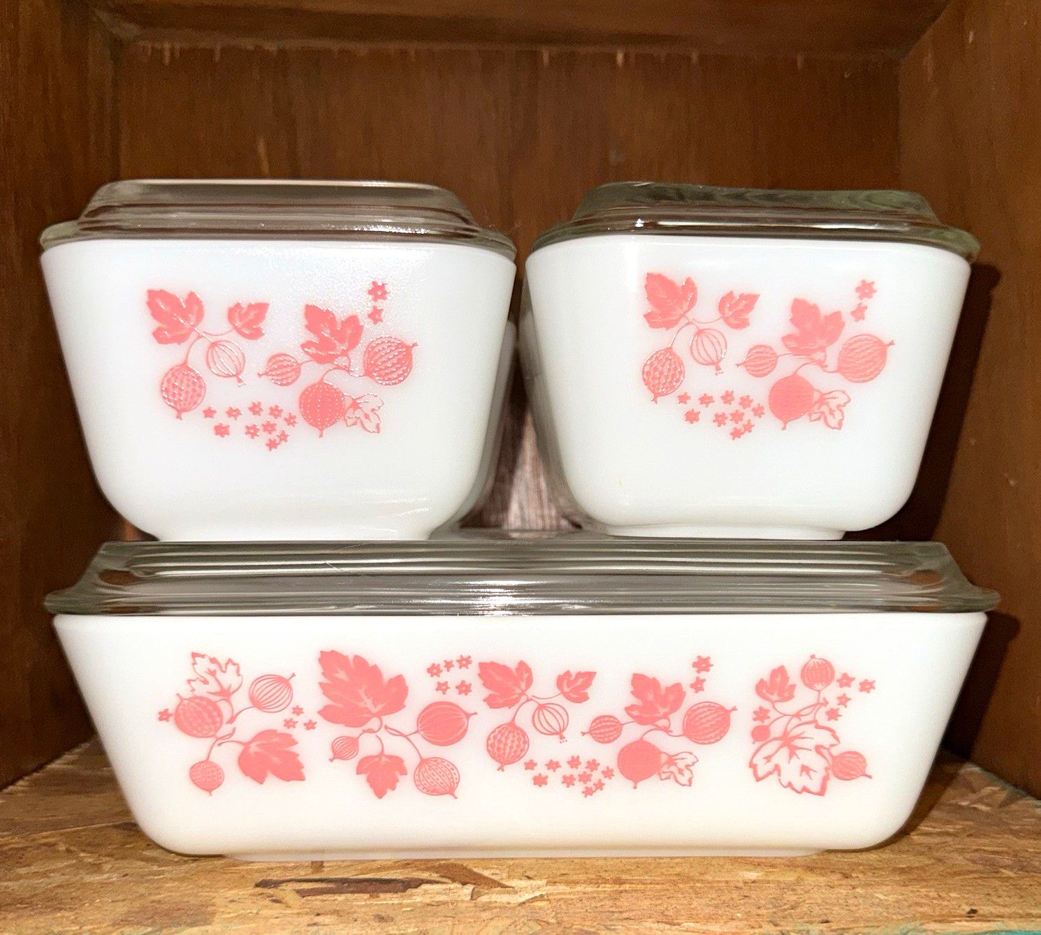 Pyrex Gooseberry Pink refrigerator set. Complete eight piece set.