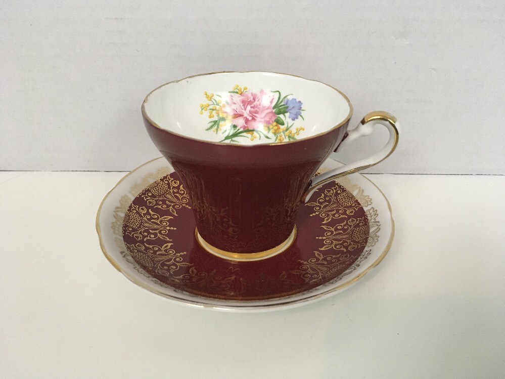 Royal Stafford tea cup and saucer gold gilt maroon  teacup pattern Rose