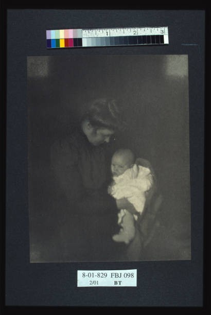 Mother child circa 1900 Photograph shows a woman seated holding an- Old Photo 1 Mother child circa 1900 Photograph shows a woman seated holding an- Old Photo 1