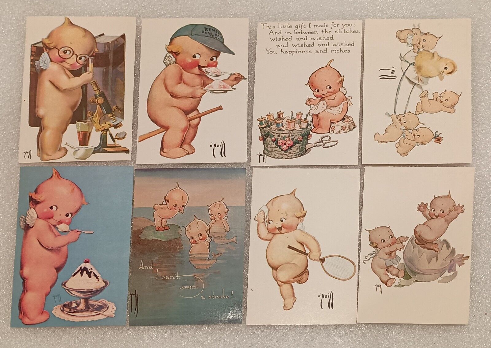 Lot of 8 - vintage Kewpie Doll Postcards by Rose O'Neill
