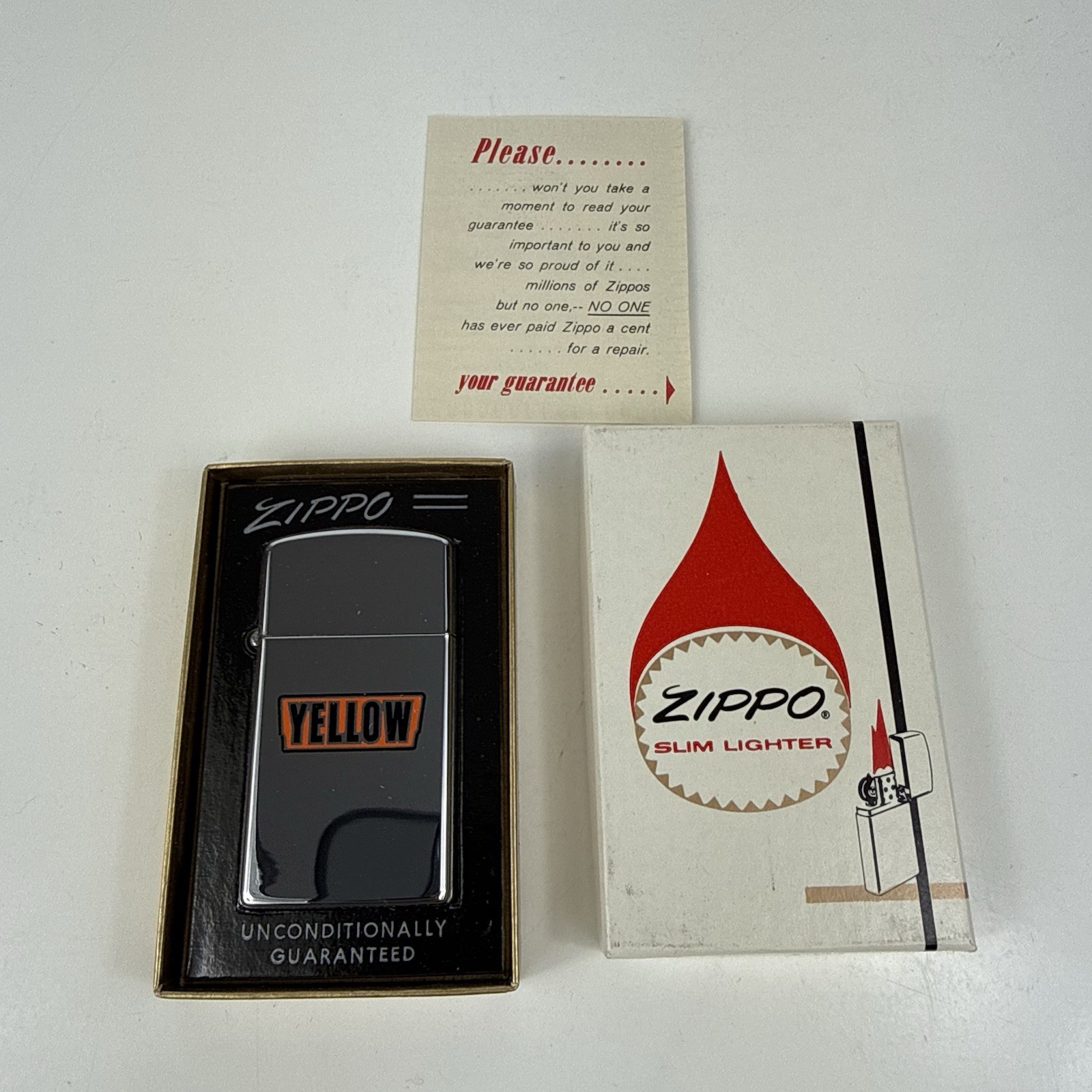 1965 Flat Bottom ZIPPO Slim Lighter Original Box - New Old Stock Yellow Trucking