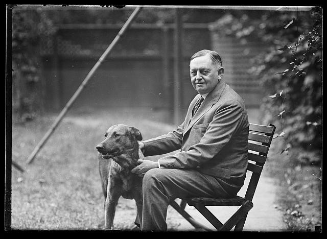 Photo:[Oscar Underwood with dog]