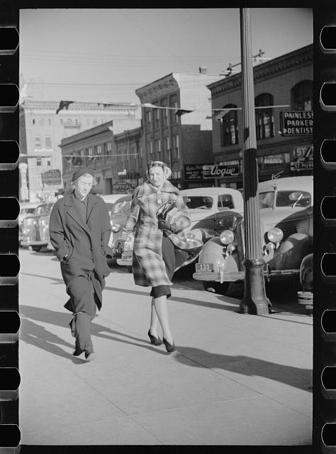 Photo:1930s Downtown Street Fashion Walk Vintage Cars Storefronts