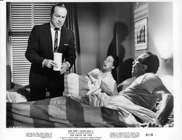 Bob Hope holding canister between stunned couple bed a scene film - Old Photo
