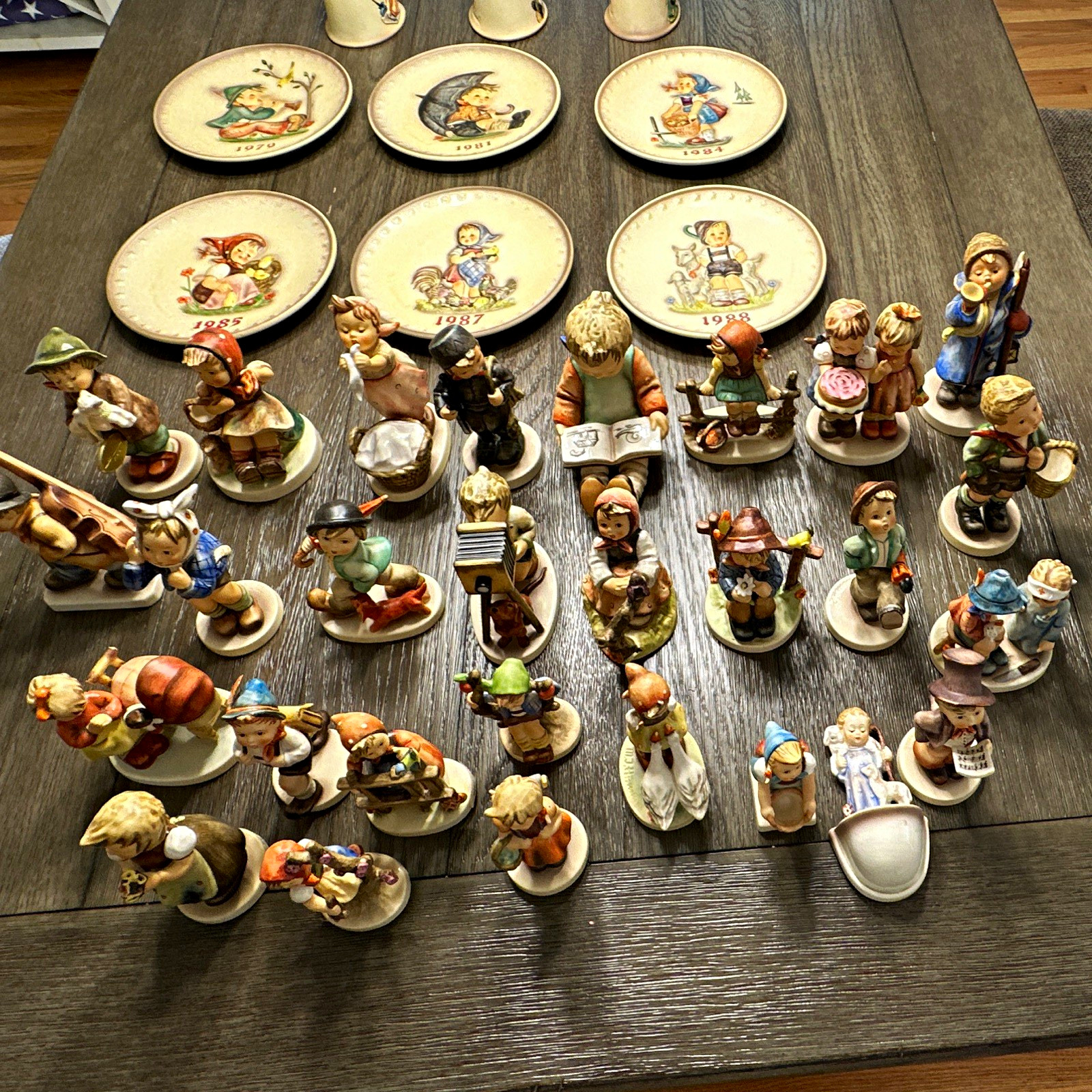 Hummel Style Collectible Figurines Lot w/ Dated Plates Decorative Plates & Bells