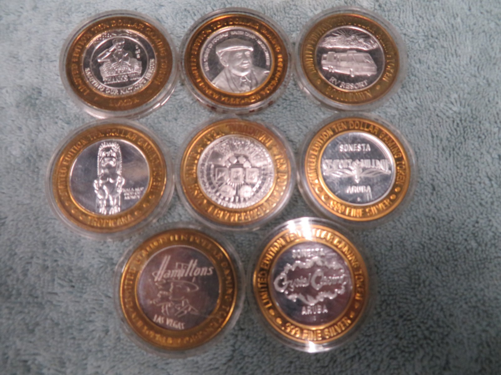 8 assorted Casino collector Tokens with 4.8 ounces of silver.-Free Ship