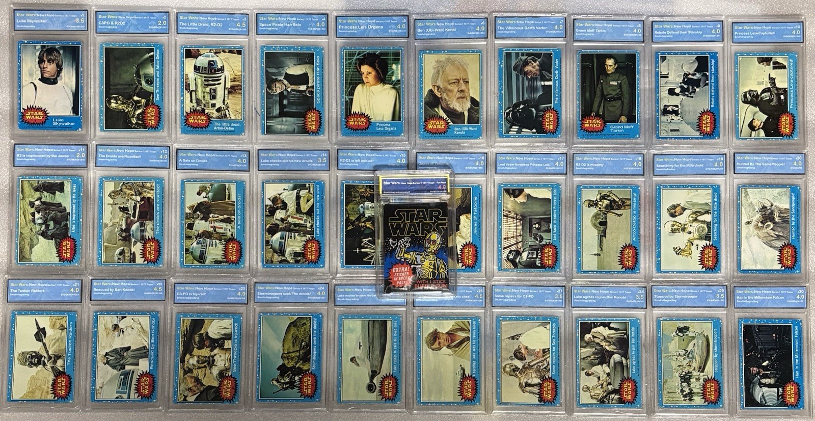 1977 Topps Star Wars 1st Seri Blue 66 Card , Sealed Fun Pack & Stickers Graded 1977 Topps Star Wars 1st Seri Blue 66 Card , Sealed Fun Pack & Stickers Graded