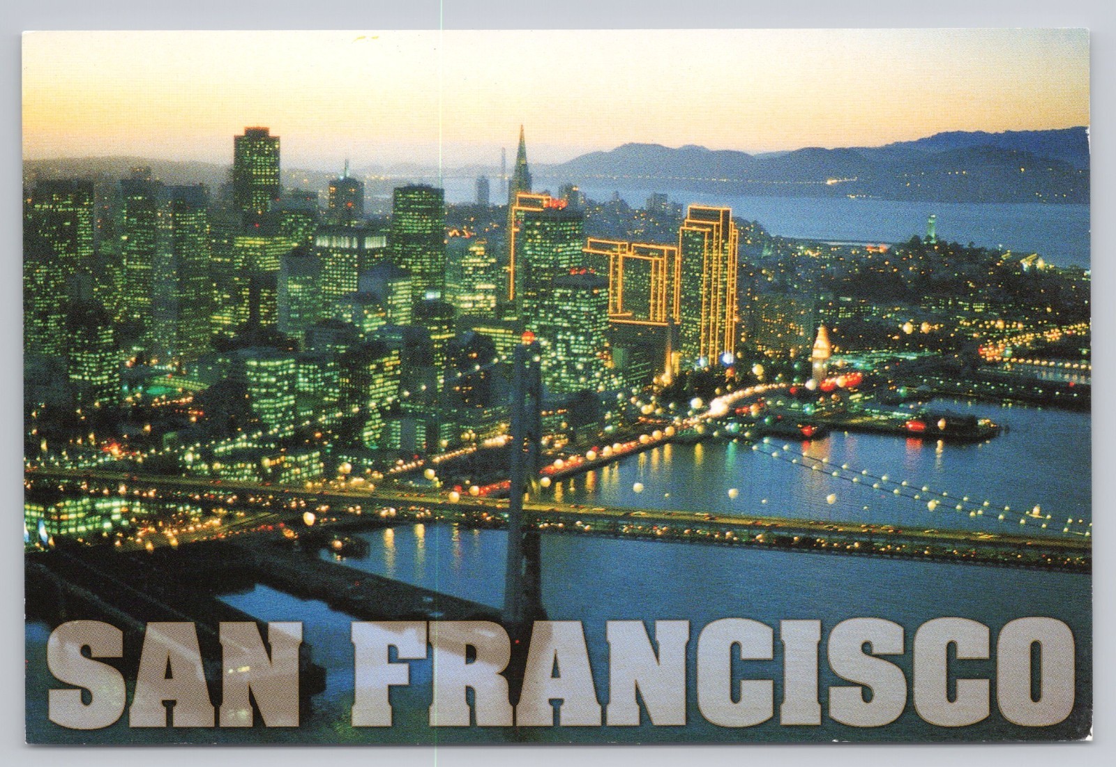 Postcard An aerial view of San Francisco at dusk  Bay Bridge