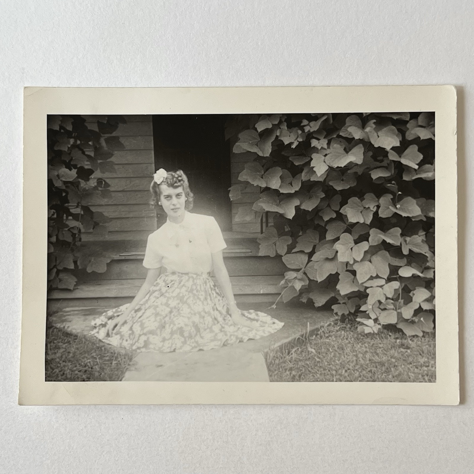 Vintage Snapshot Photograph Beautiful Young Woman Sitting On Outside Glowing